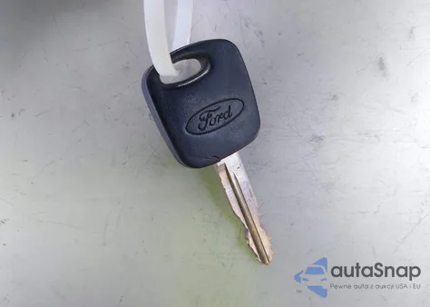 2001 Ford Focus Lx z USA, uszkodzony, nr VIN 1FAFP33P31W327982